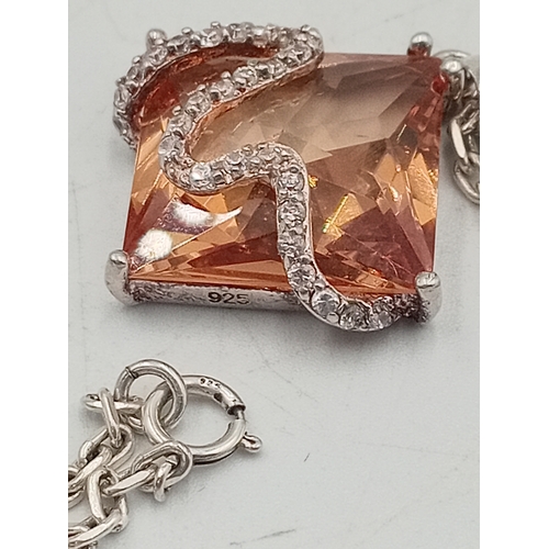 391 - Two stamped 925 silver neckslces. One has a 925 silver pendant set with amber and the other is a sta... 