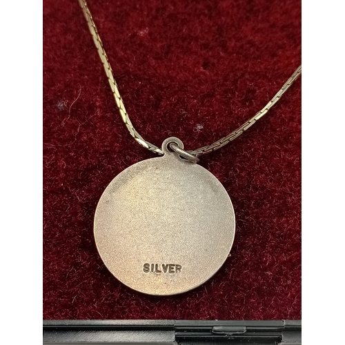 393 - Two stamped 925 silver necklaces. One has a stamped silver Aries pendant and a hallmarked 925 child ... 