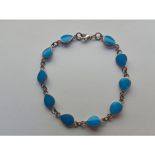 378 - A stamped 925 silver teardrop bracelet.