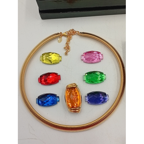 394 - A collection of costume jewellery. To include; two Joan rivers necklaces one has interchangeable gem... 