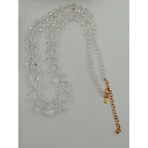 394 - A collection of costume jewellery. To include; two Joan rivers necklaces one has interchangeable gem... 