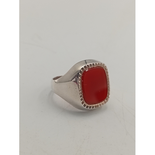398 - A silver signet ring stamped silver with gold plating. Size S