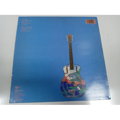 4 - Dire straits brothers in arms. Mint condition vinyl record.