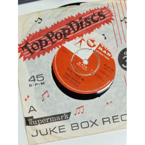 99 - A collection of APX 50 7 Inch singles. To include the bee gees, chuck Berry, Joan baez, John Leyton.... 