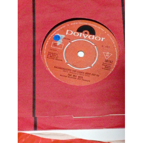 99 - A collection of APX 50 7 Inch singles. To include the bee gees, chuck Berry, Joan baez, John Leyton.... 