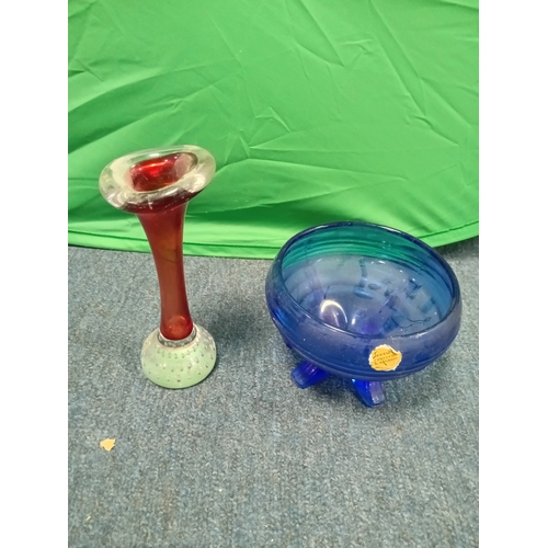 21 - A pair of art glass and a resin paperweight.