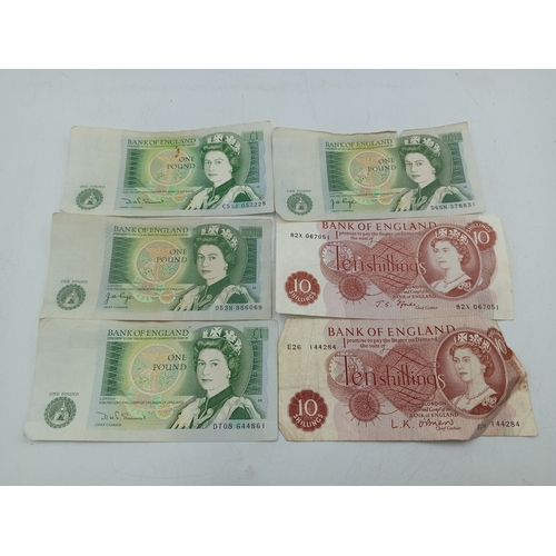 A collection of vintage English notes to include one pound notes and ...