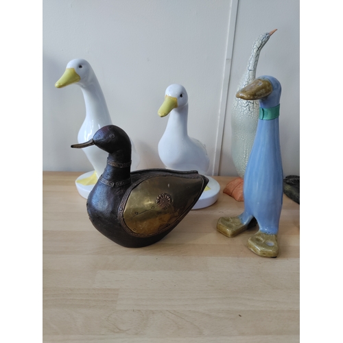 17 - A collection of decorative ducks and a chicken, ceramic and wood. the largest is 38cm in height. the... 
