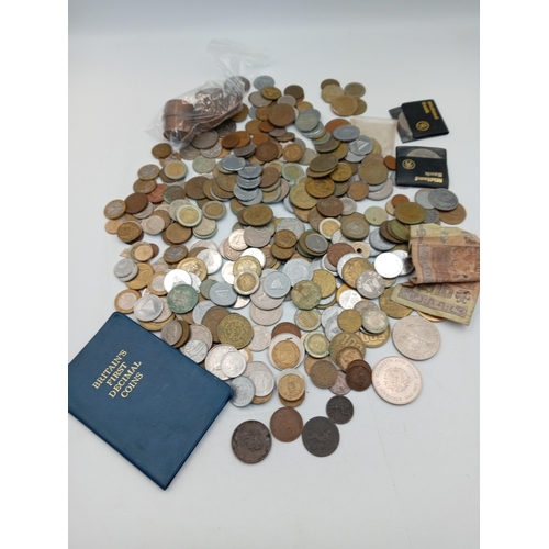 300 - A good quantity of mixed coins age including Pre decimal British and other world coins. Also includi... 
