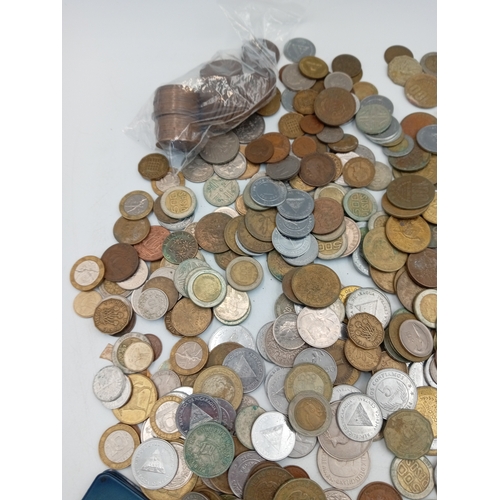 300 - A good quantity of mixed coins age including Pre decimal British and other world coins. Also includi... 