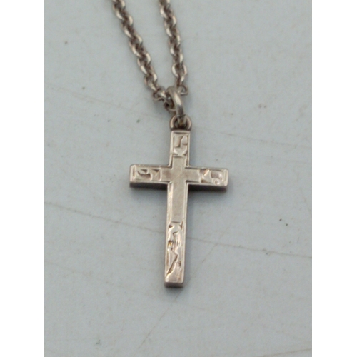 322 - A silver crucifix pendant on chain, cross stamped SILVER, chain stamped STERLING, chain 40cm long