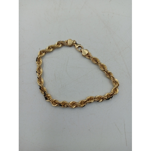 330 - A gold coloured rope twist bracelet marked 925 & 9ct Bonded Gold, 19cm long.