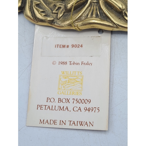 252 - A pair of limited edition ornamental American Carousel Horses by Tobin Fraley, No 9078 & 9024, 1988 ... 