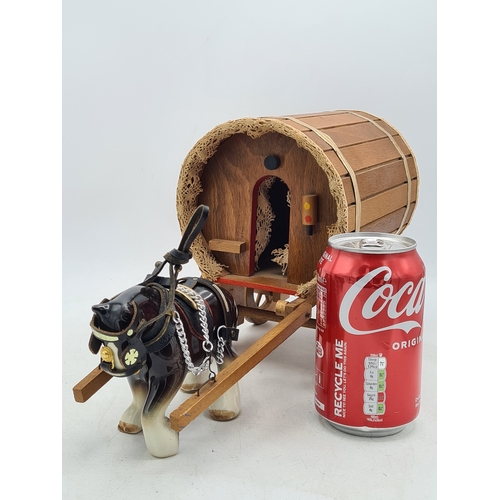 6 - A Ornamental Ceramic Shire Horse With a Romany Rose Wooden Traveller's Caravan.