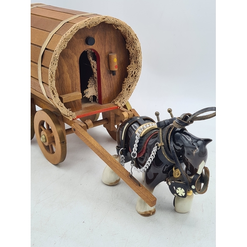 6 - A Ornamental Ceramic Shire Horse With a Romany Rose Wooden Traveller's Caravan.