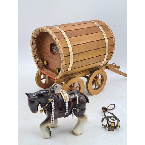 6 - A Ornamental Ceramic Shire Horse With a Romany Rose Wooden Traveller's Caravan.