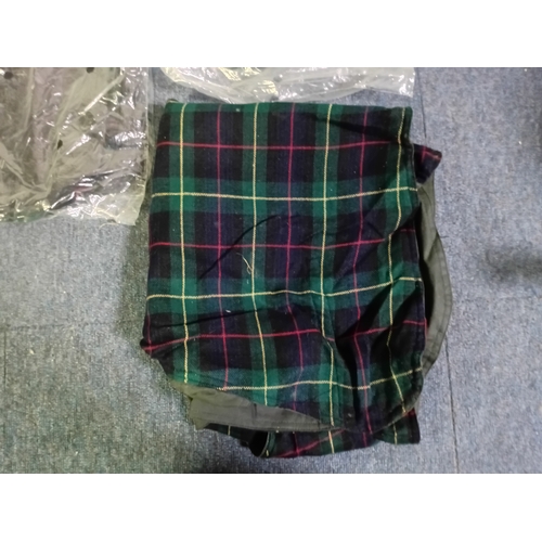 13 - 8 Wax jacket dog coats. All different sizes and 2 of them have no packaging but 6 of them are still ... 