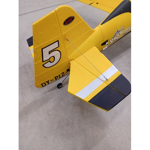 A large Dynam Pitts Python model 12 RC yellow bi-plane.