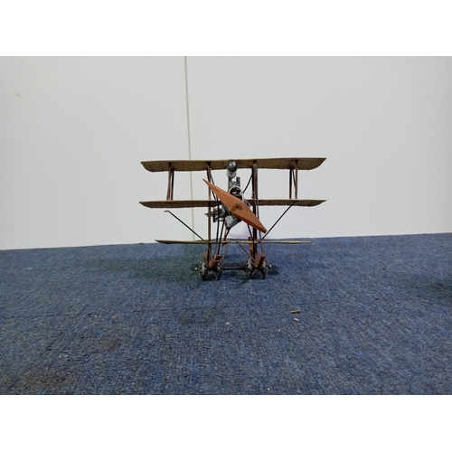 28 - A vintage tinplate model triplane