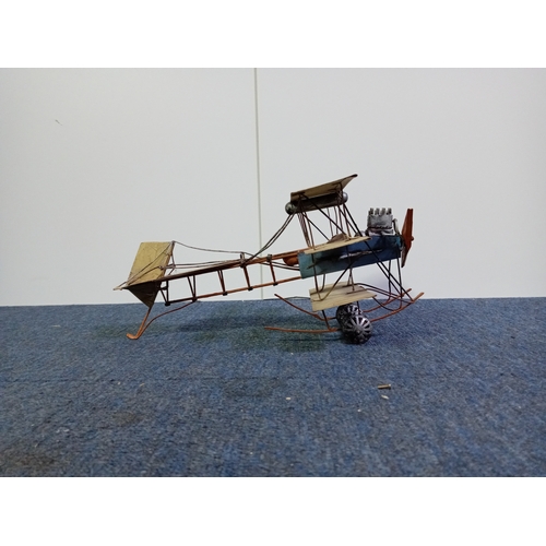 28 - A vintage tinplate model triplane