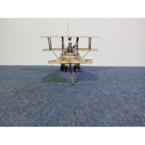 28 - A vintage tinplate model triplane