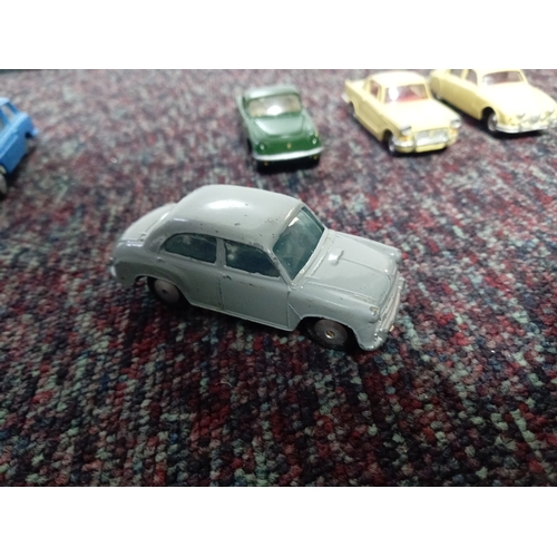 5 restored Dinky cars.