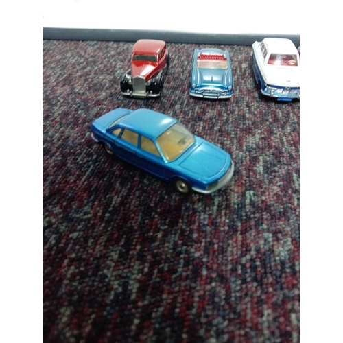 5 vintage restored Dinky cars.