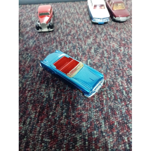 5 vintage restored Dinky cars.