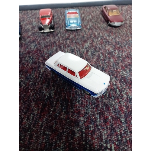 5 vintage restored Dinky cars.