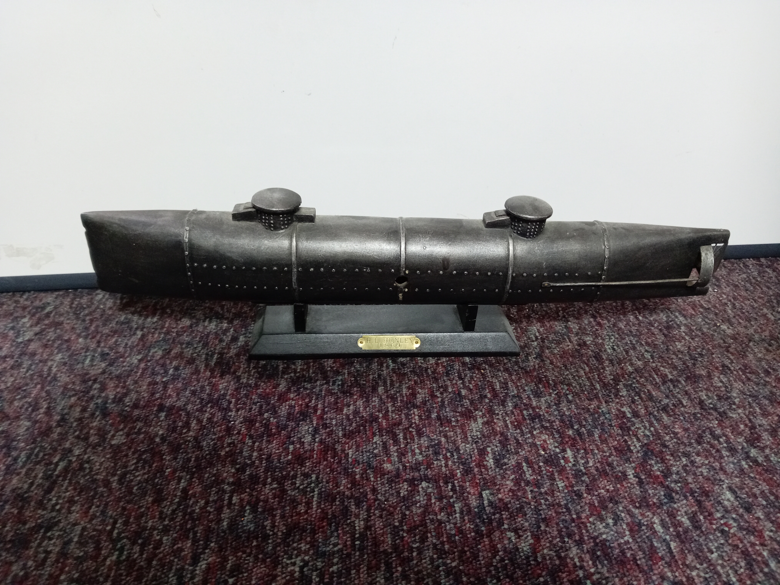 A scale steel display model of the CSS H. L. Hunley 1964, a historic ...