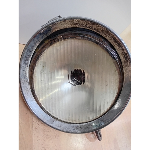 249 - A pair of vintage vehicle lamps, to include; a CAV lamp