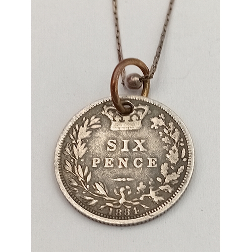 358 - A stamped 925 silver bead necklace with an 1884 silver six pence pendant.
