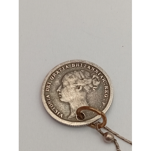 358 - A stamped 925 silver bead necklace with an 1884 silver six pence pendant.