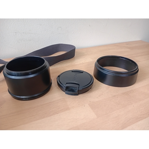 102 -  A Sony Cyber-shot DSC-H5 digital camera with a carrying case by laystor professional,and the cover ... 