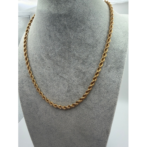 84 - A stamped 375 9ct gold rope chain. Length 18