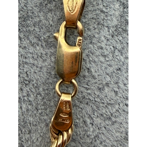 84 - A stamped 375 9ct gold rope chain. Length 18