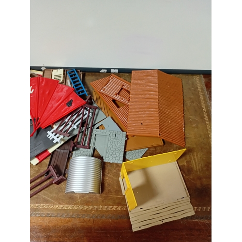 A collection of timpo building sets to includes, walls, roofs, and tents.