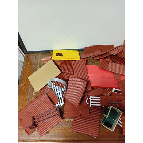 A collection of timpo building sets to includes, walls, roofs, and tents.