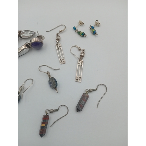 119 - Seven sets of earrings including a pair of Mackintosh style examples, an pearl and amethyst example,... 