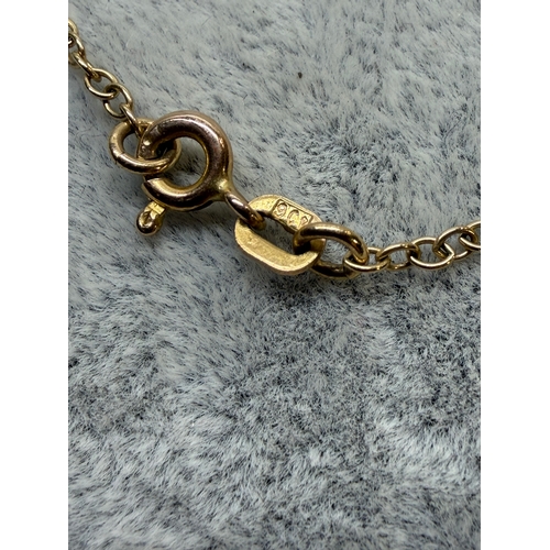 168 - A stamped 375 9ct gold necklace. Length 18 inches. Weight 1.9g
