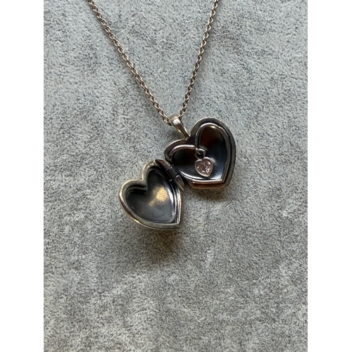 197 - A stamped 925 Pandora necklace with a love heart Locket featuring Cz. Length 26 inches.