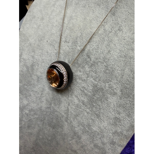 199 - A Belle Etoile Modernist orange cubic zirconia and enamel sterling silver pendant on silver change. ... 
