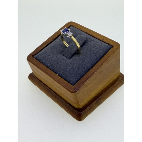 223 - A 18ct yellow gold trilogy design cushion cut sapphire and diamond engagement ring. Size I and 1/2. ... 