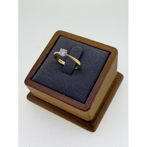 224 - A 18ct yellow gold solitaire engagement ring with a 3rd of a carat VVS2 diamond. Size N. Weight 3g.