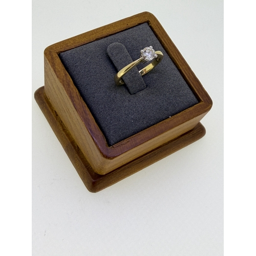 224 - A 18ct yellow gold solitaire engagement ring with a 3rd of a carat VVS2 diamond. Size N. Weight 3g.