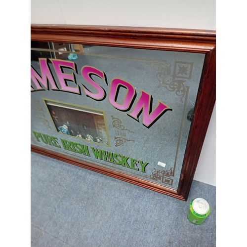 101 - A vintage mirror with JAMESON Irish whiskey branding. (Height 63 cm x Width 88 cm)