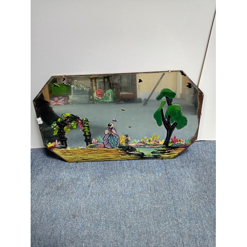 102 - A vintage hand painted Art Deco wall mirror known as 
