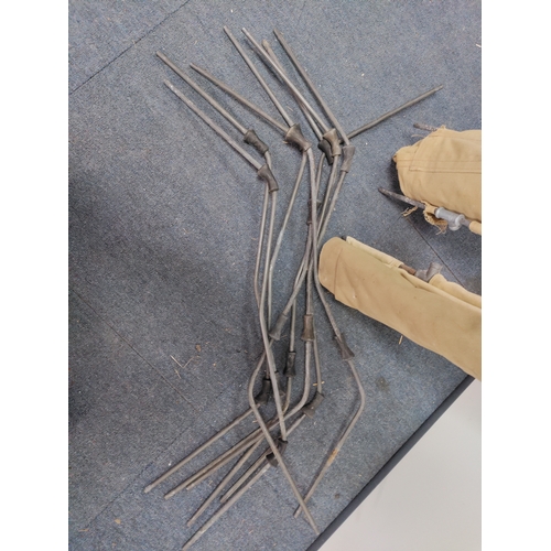 65 - A pair of military camp beds.