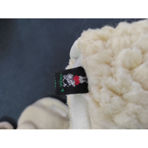 66 - A collection of 7 sheepskin wool saddle pads.