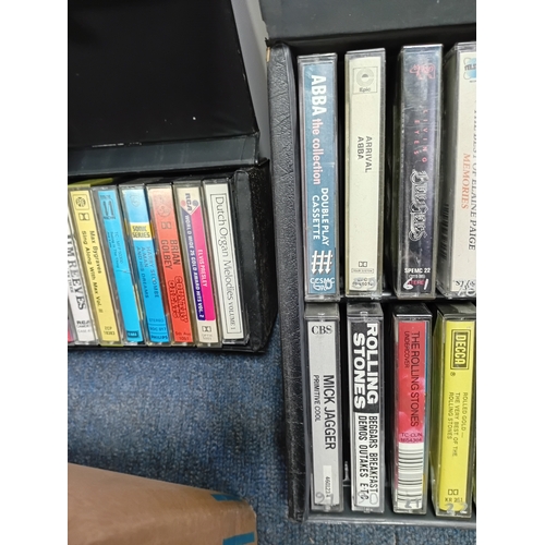 73 - A large selection of audio cassettes of various genres